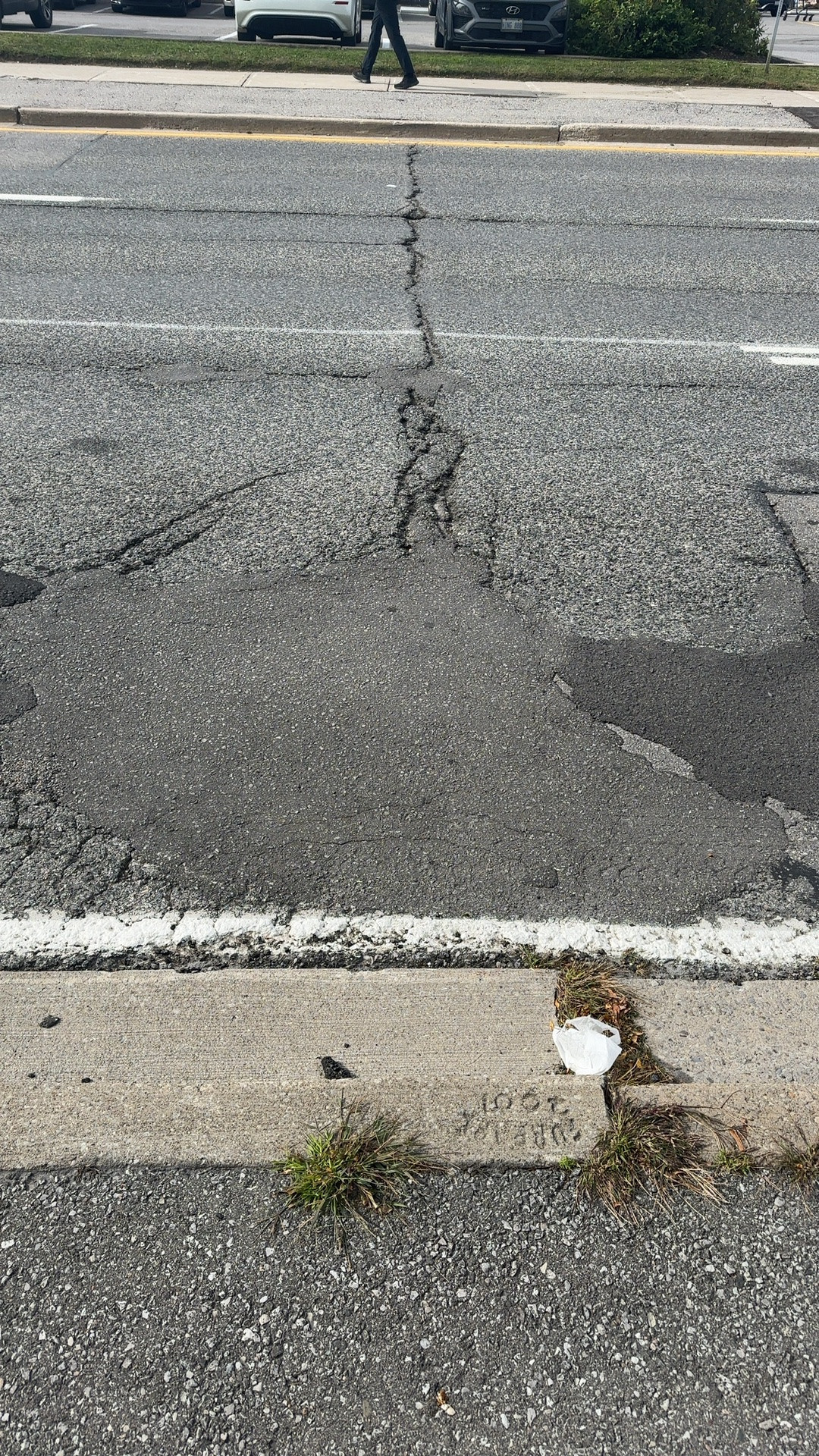 Road Damage at 3078A Don Mills Road East